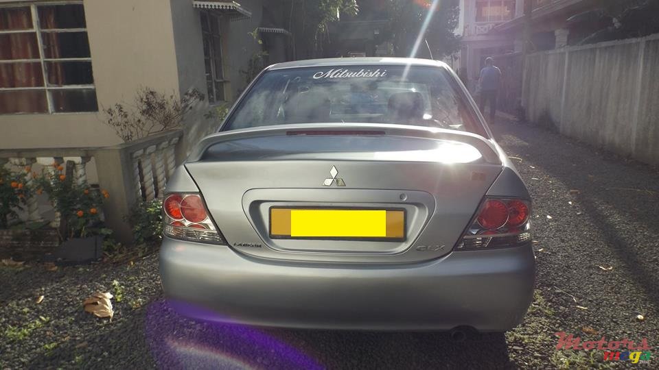 2004' Mitsubishi Lancer GLX photo #6