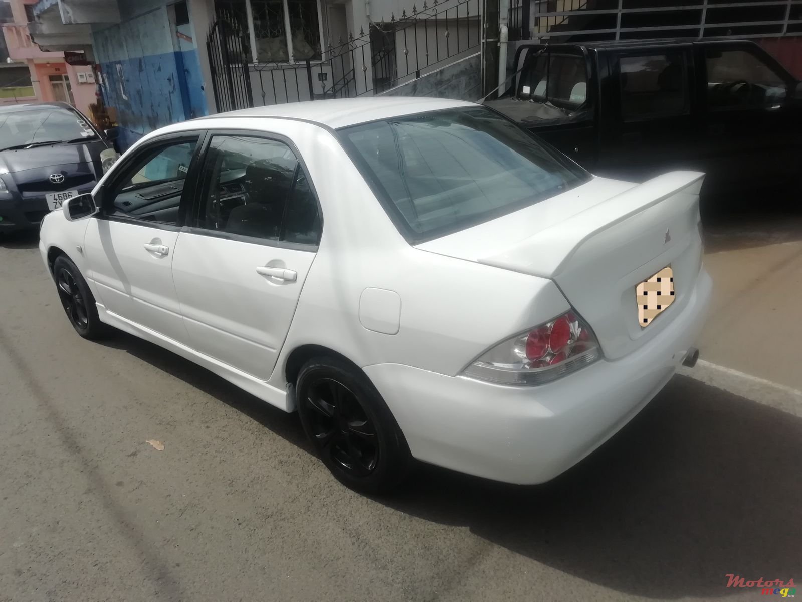 2004' Mitsubishi Lancer photo #4