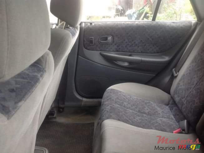 1999' Mazda 323 photo #6