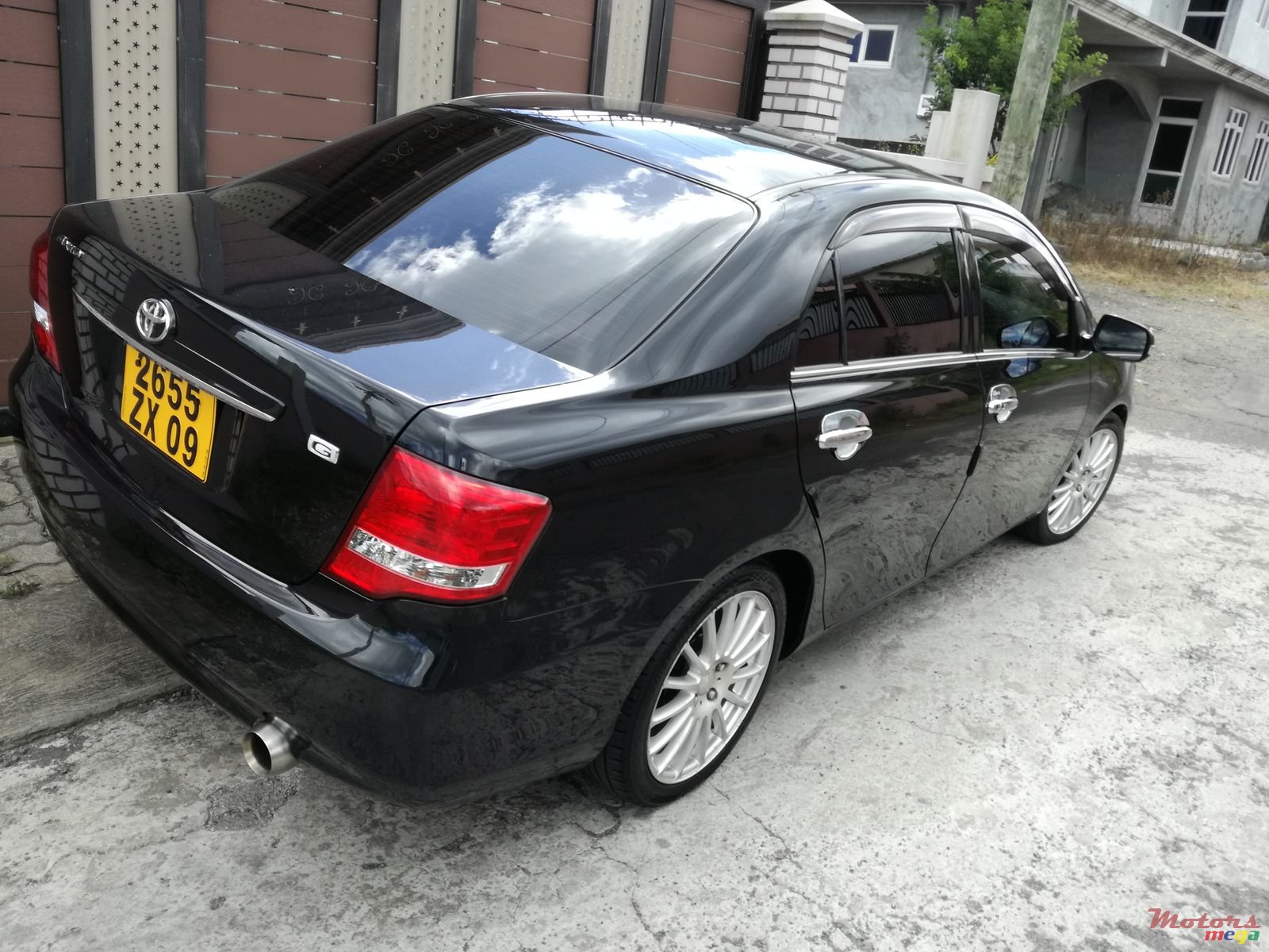 2009' Toyota Axio Grade G saloon photo #1