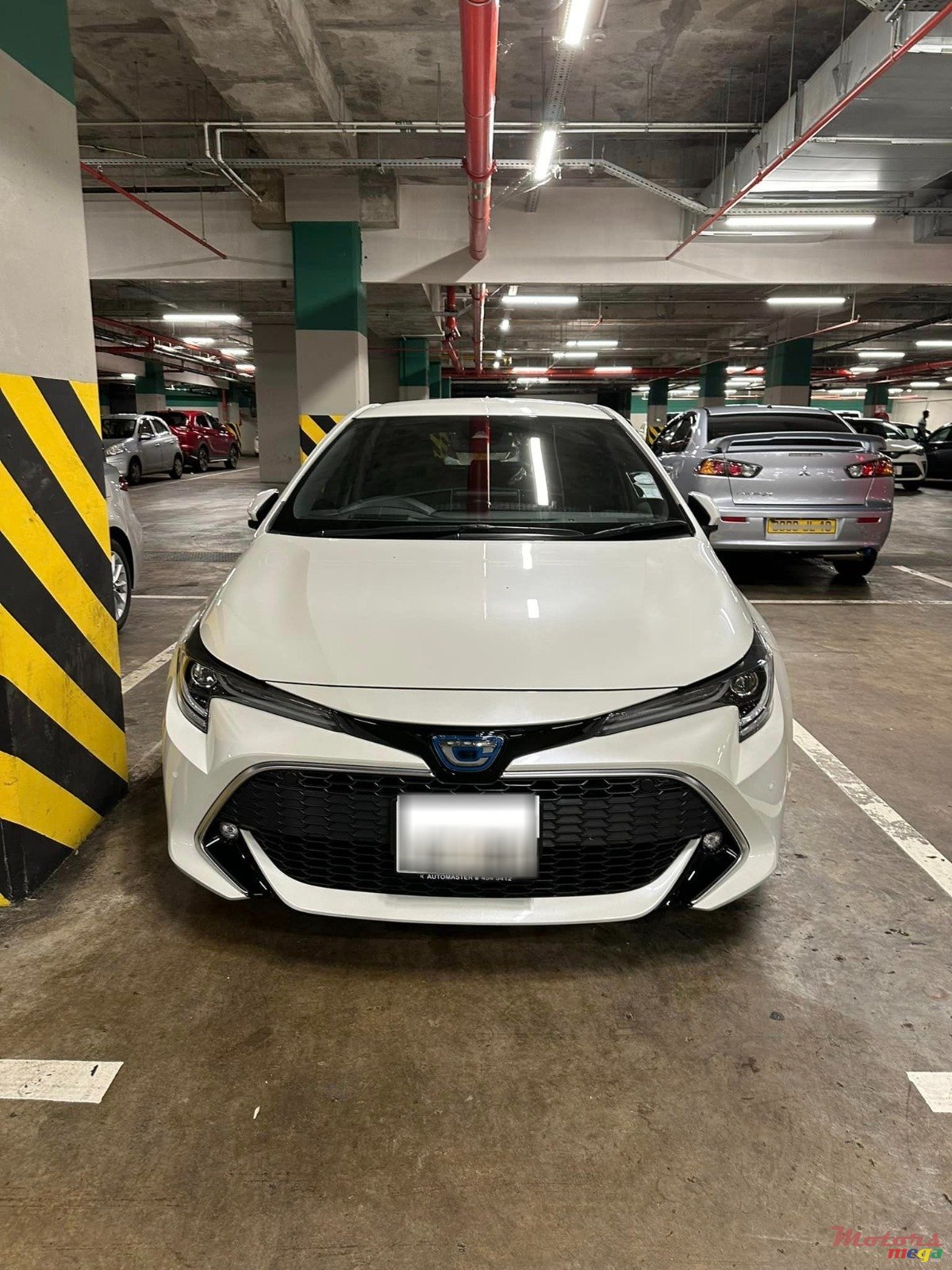 2020' Toyota Corolla Sport photo #1