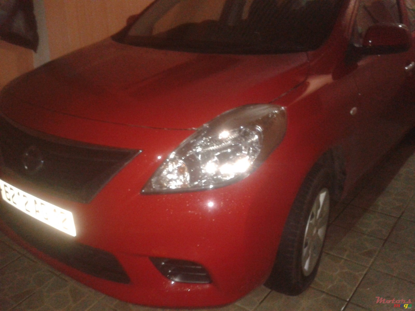 2012' Nissan Almera photo #2