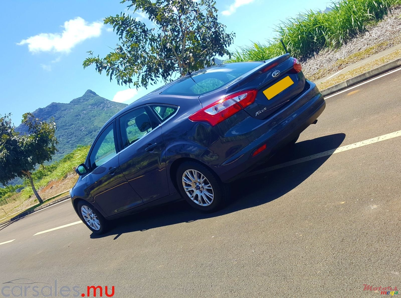 2014' Ford Focus 1.6 Sedan Titanium photo #3