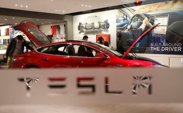 Tesla removes 'self-driving' from China website after Beijing crash