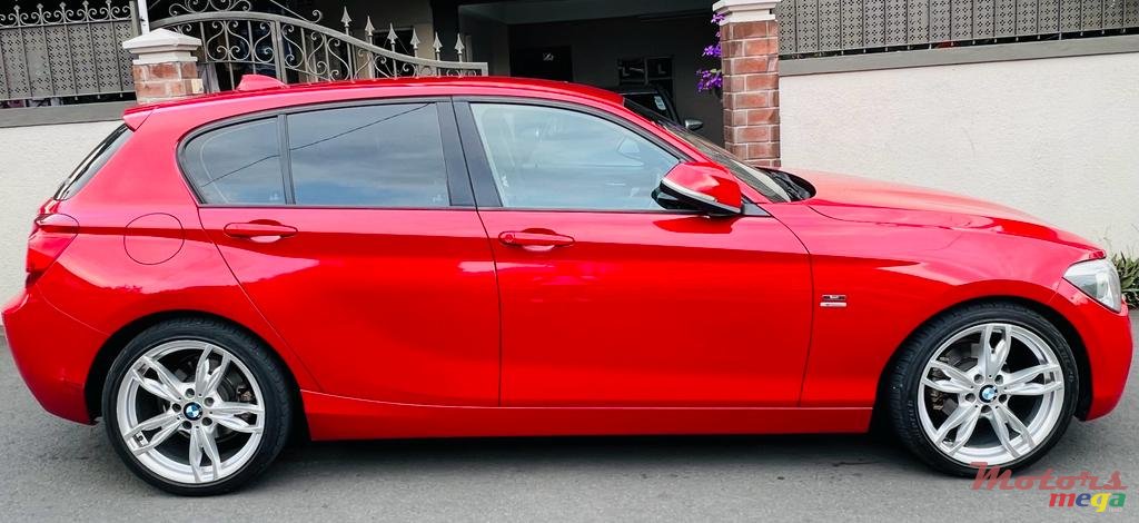 2011' BMW 116 photo #6