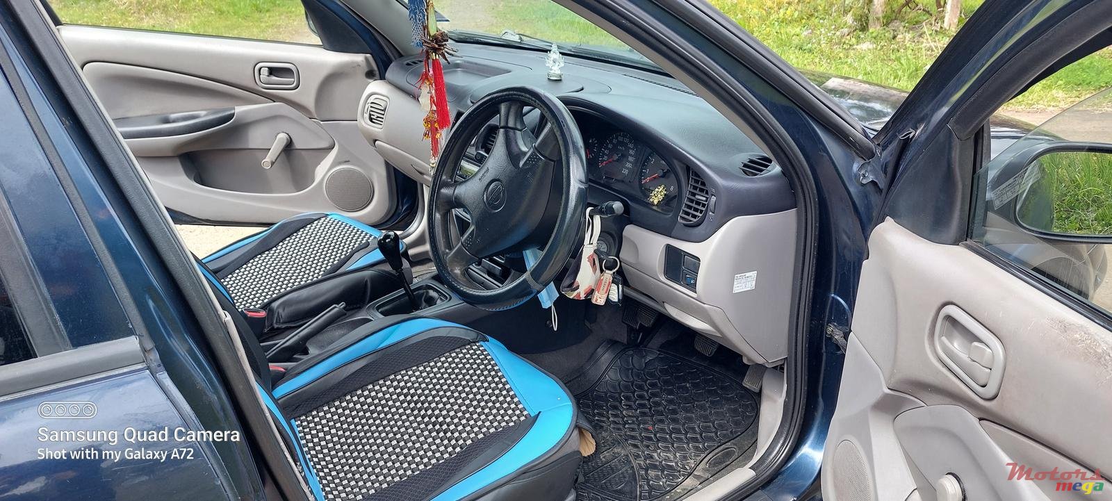 2002' Nissan Sunny photo #1