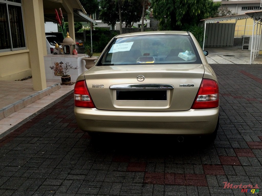 2002' Mazda 323 photo #3