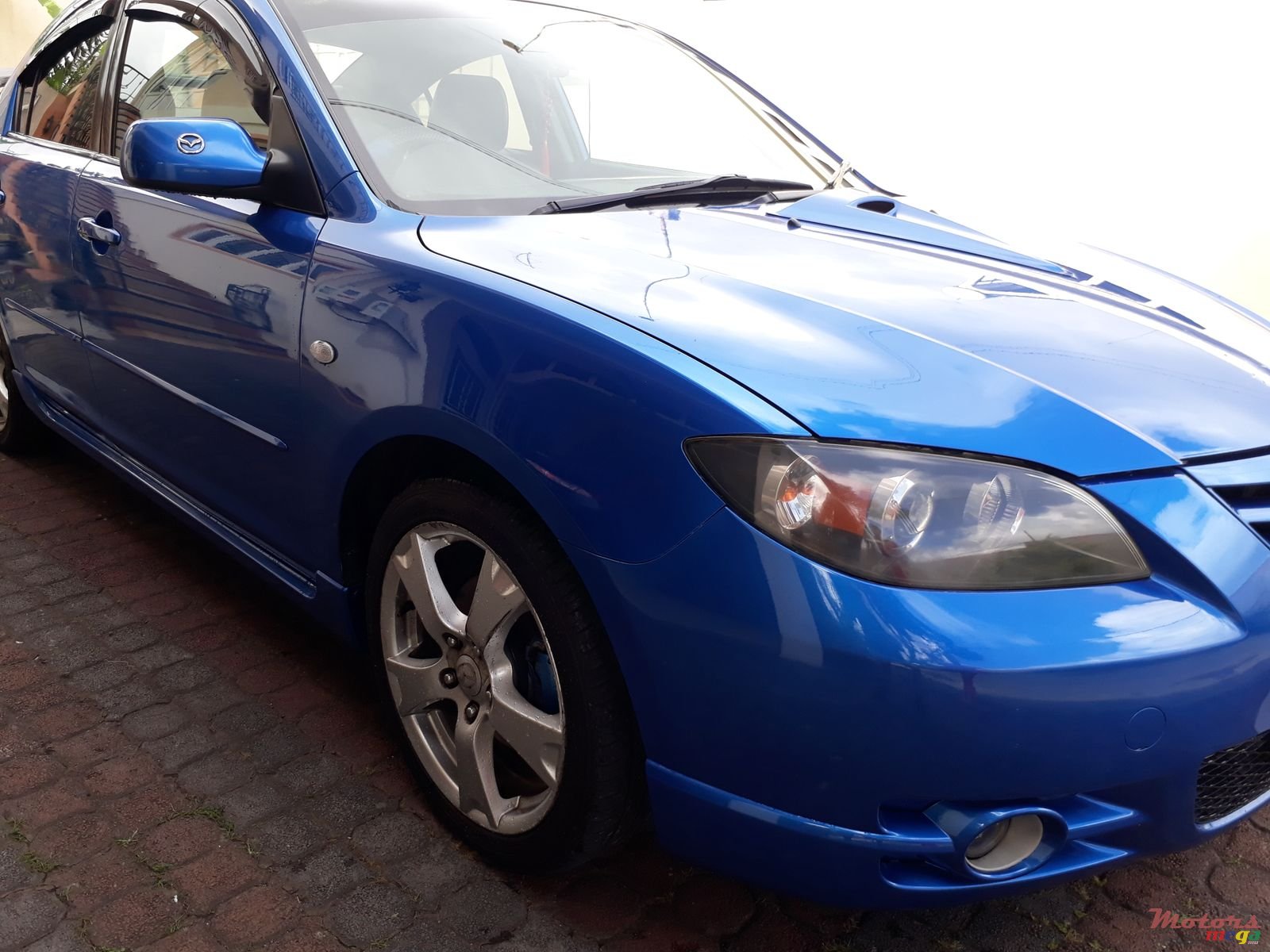 2004' Mazda 3 photo #1