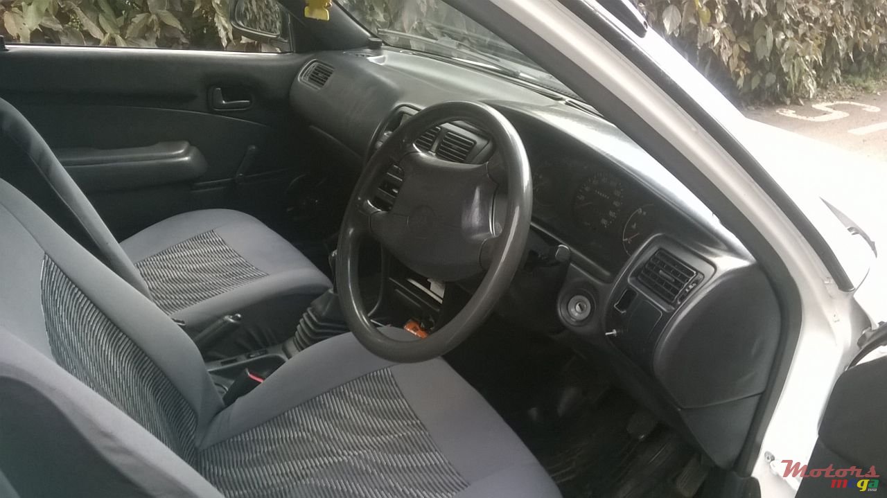 2002' Toyota Corolla spoiler..CD player etc photo #4