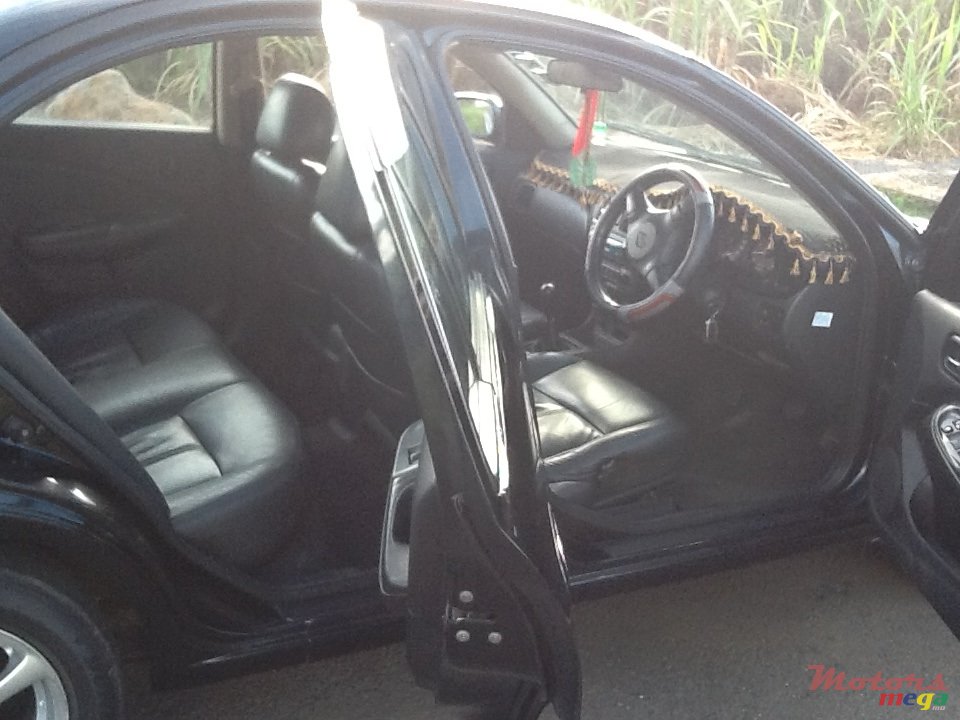 2004' Nissan Sunny photo #5