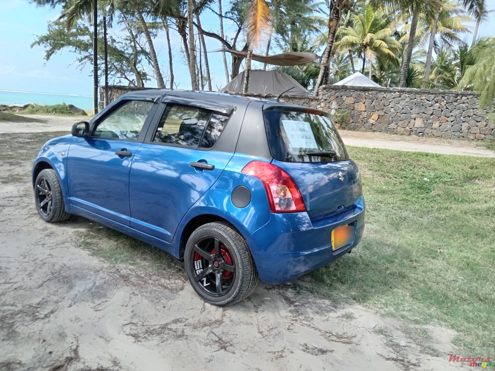 2010' Suzuki Swift photo #1
