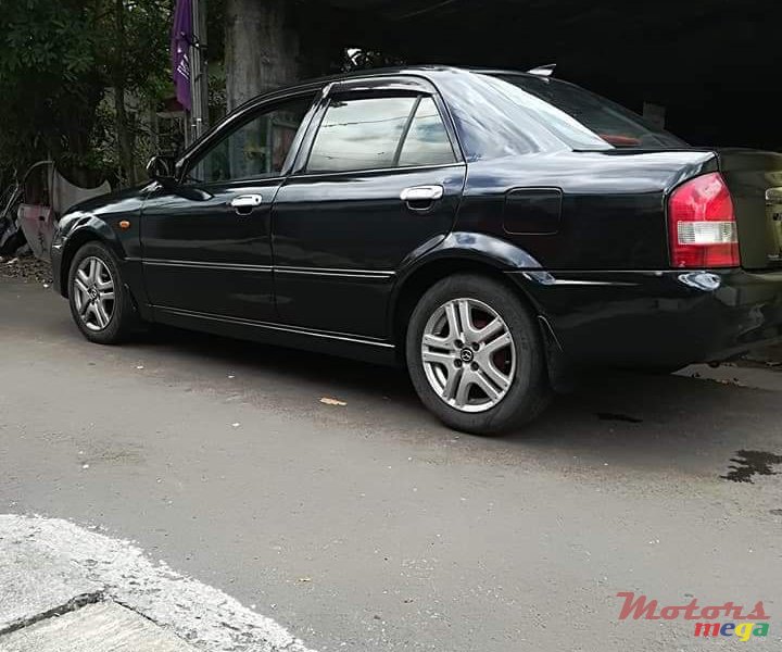 1999' Mazda 323 photo #5