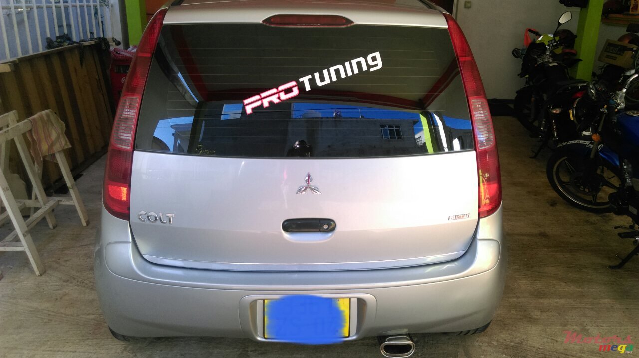 2004' Mitsubishi Colt sport photo #2