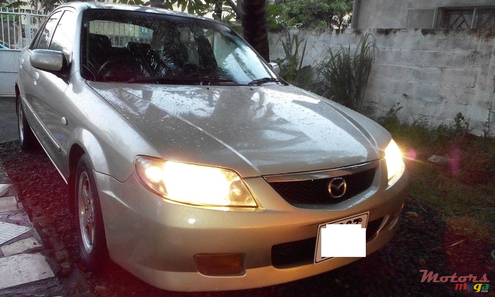 2003' Mazda 323 photo #3