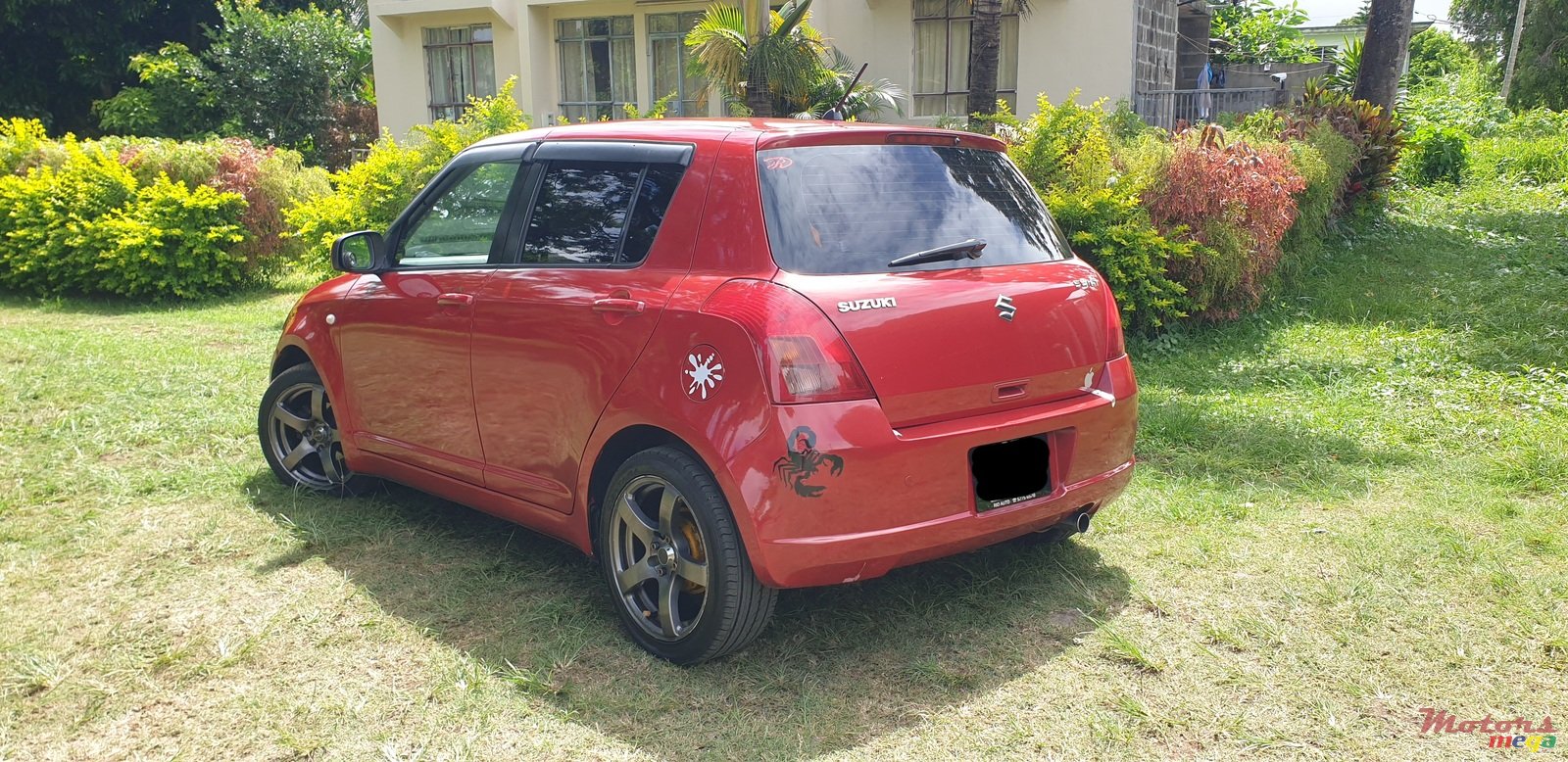 2005' Suzuki Swift 1.5 DOHC photo #3