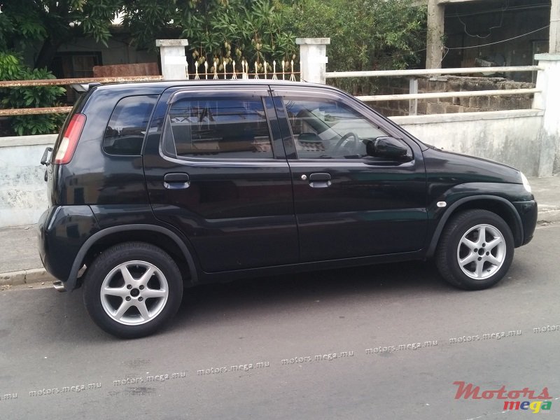 2005' Suzuki Swift 1.3 photo #1