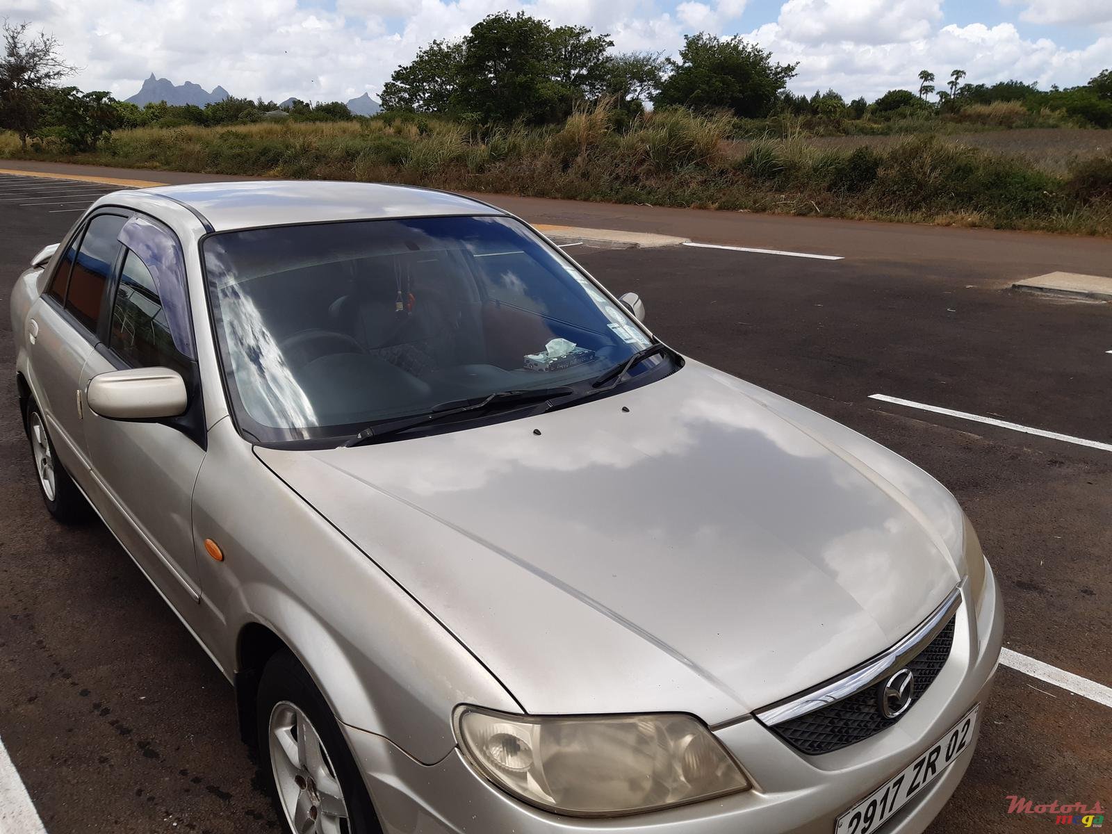 2002' Mazda 323 photo #4