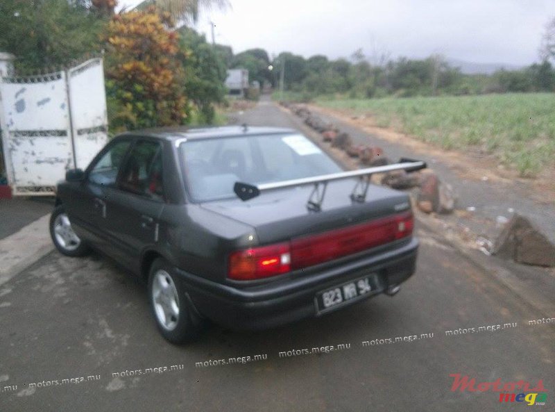 1994' Mazda 323 photo #5