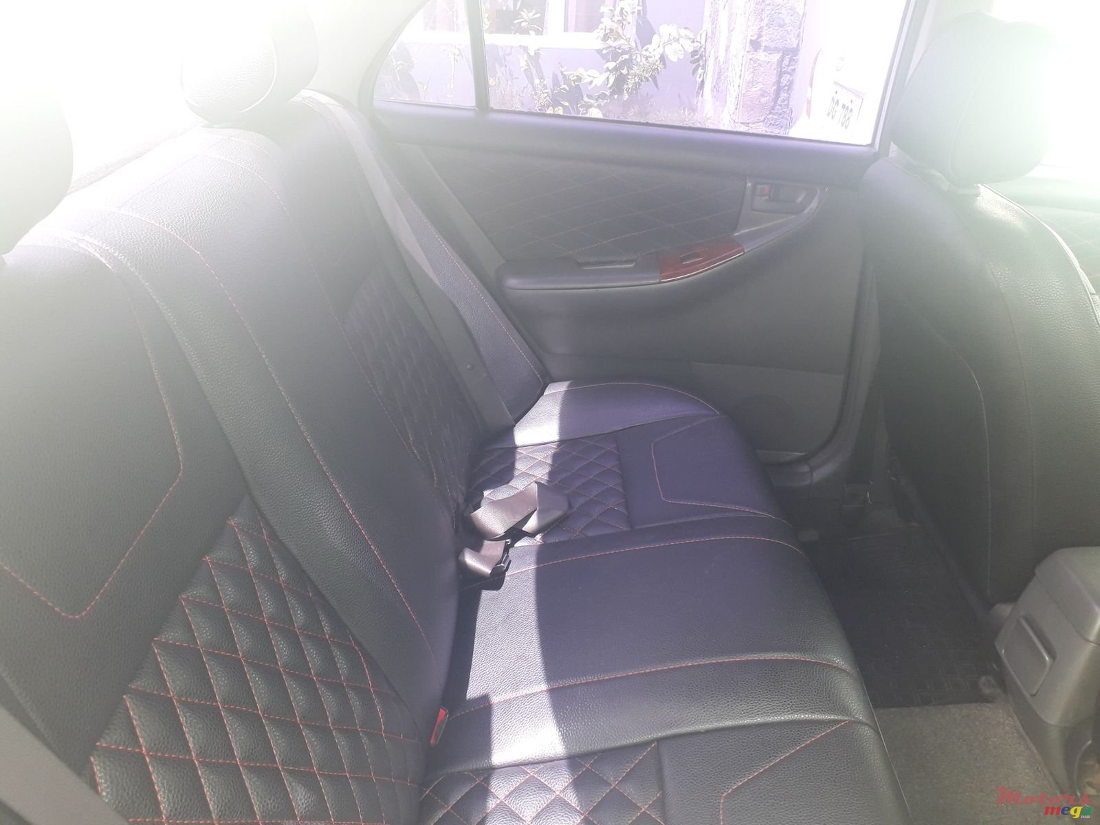 2002' Toyota Corolla NZE auto photo #4