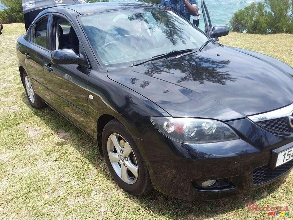 2007' Mazda 3 photo #1