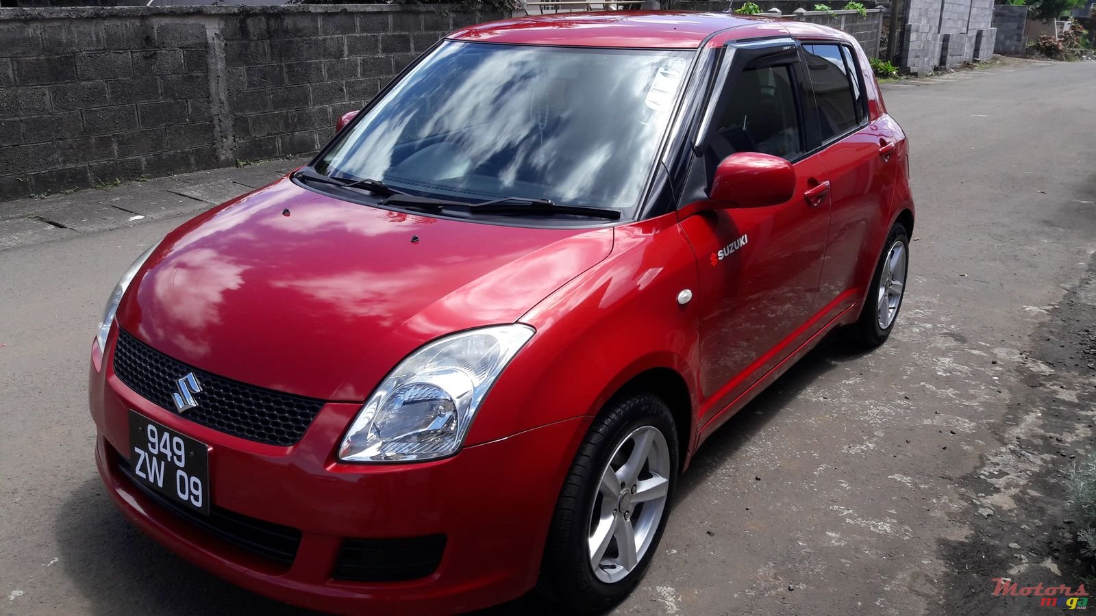 2009' Suzuki Swift Japan photo #2
