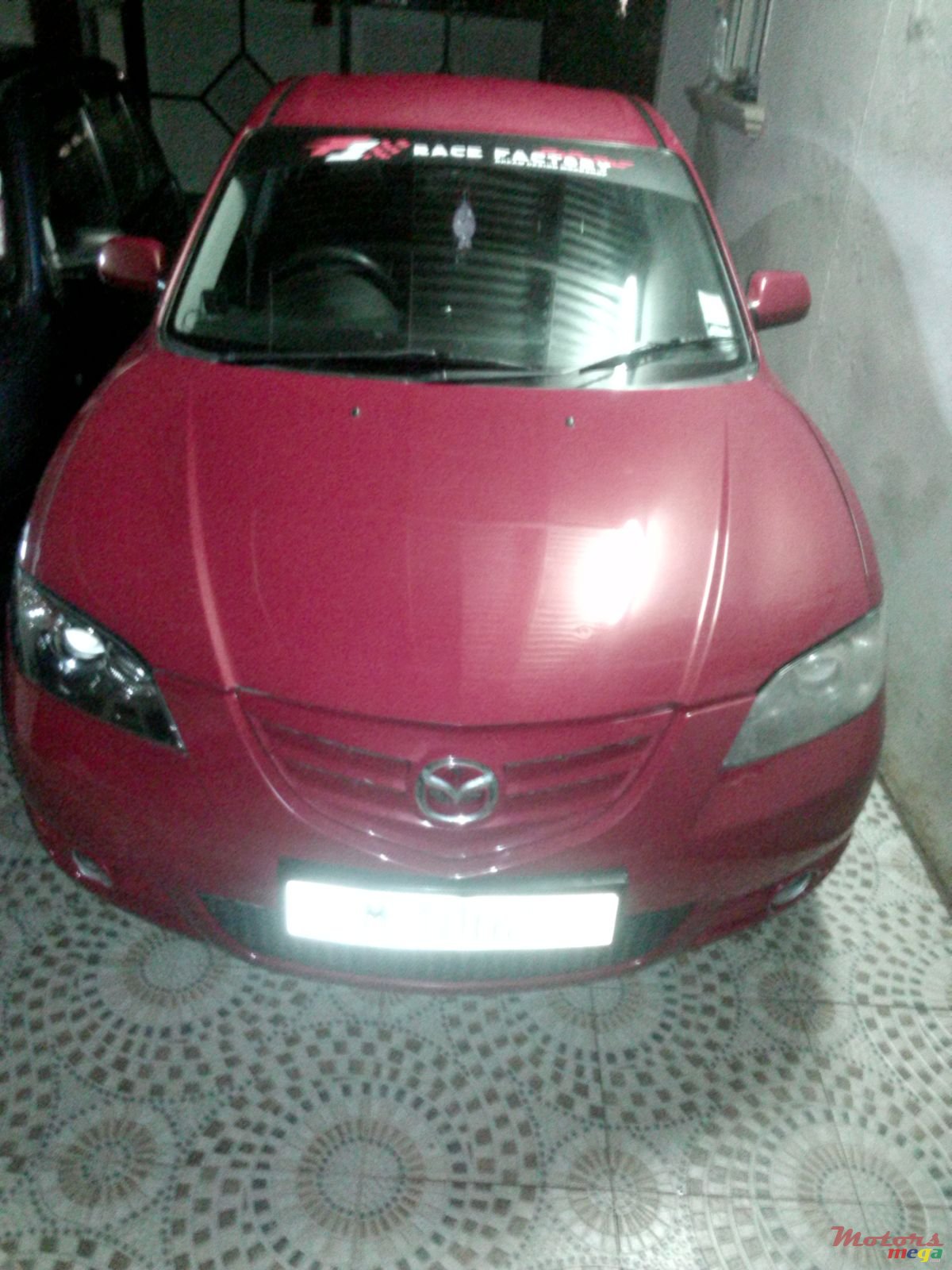 2004' Mazda 3 photo #1