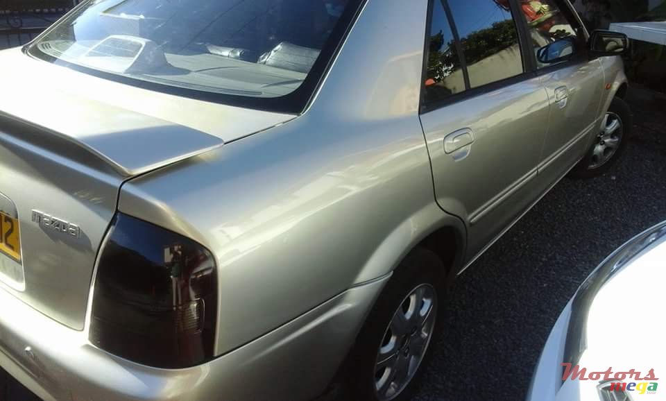 2002' Mazda 323 photo #1