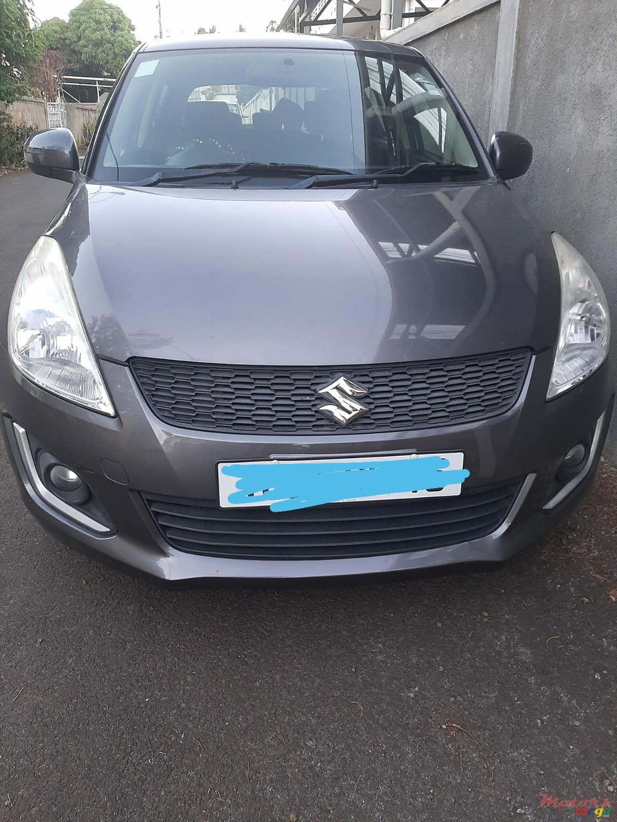 2015' Suzuki Swift photo #1