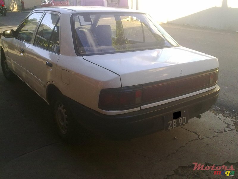 1990' Mazda 323 photo #3