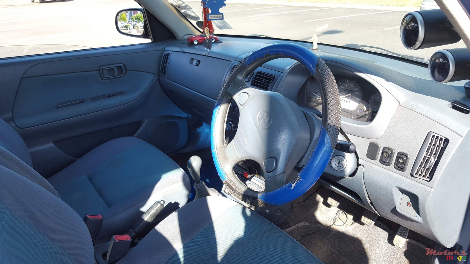 2002' Toyota Duet photo #7