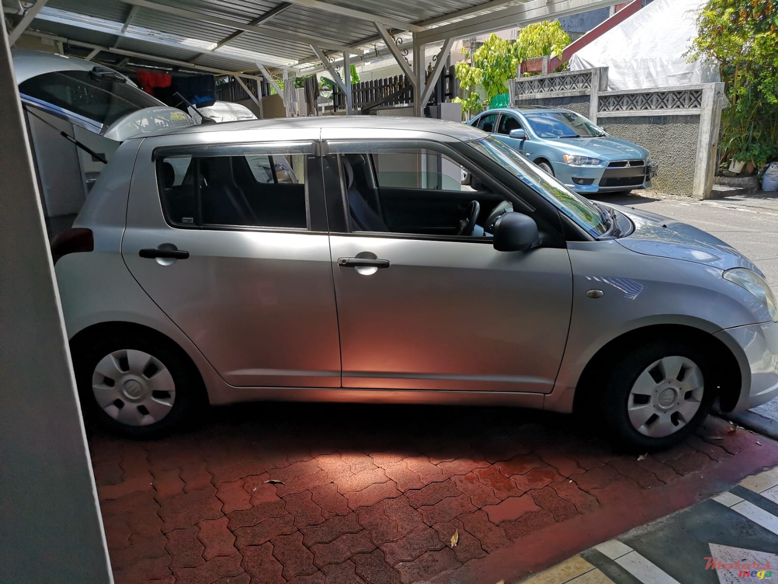 2006' Suzuki Swift photo #1