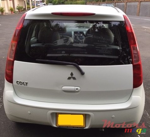 2004' Mitsubishi Colt photo #5