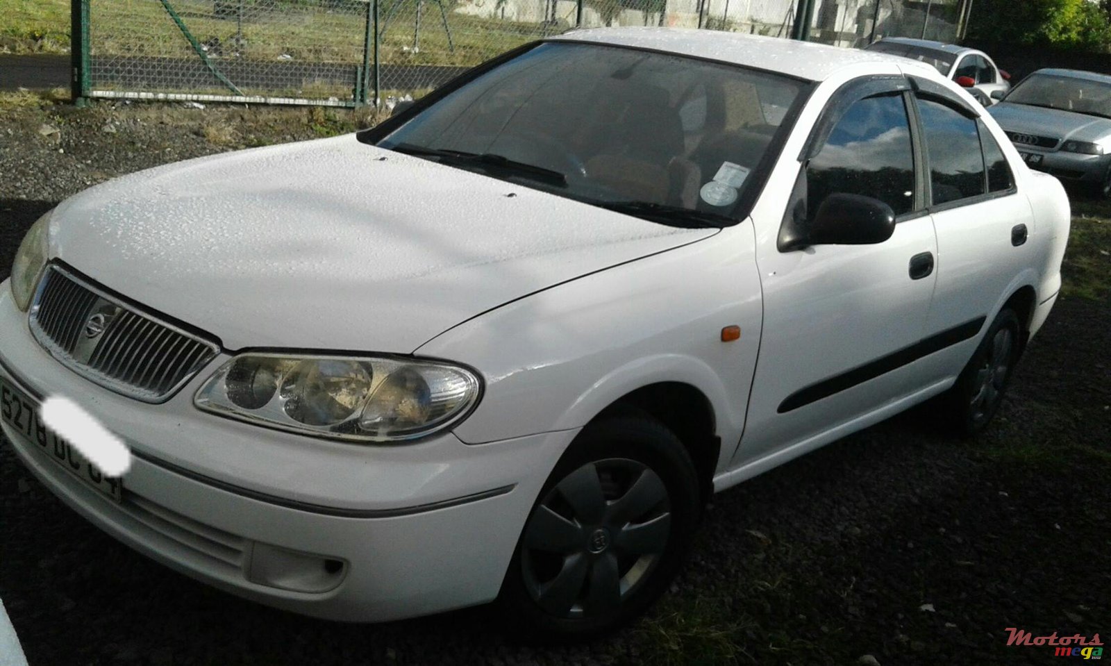 2004' Nissan Sunny photo #1