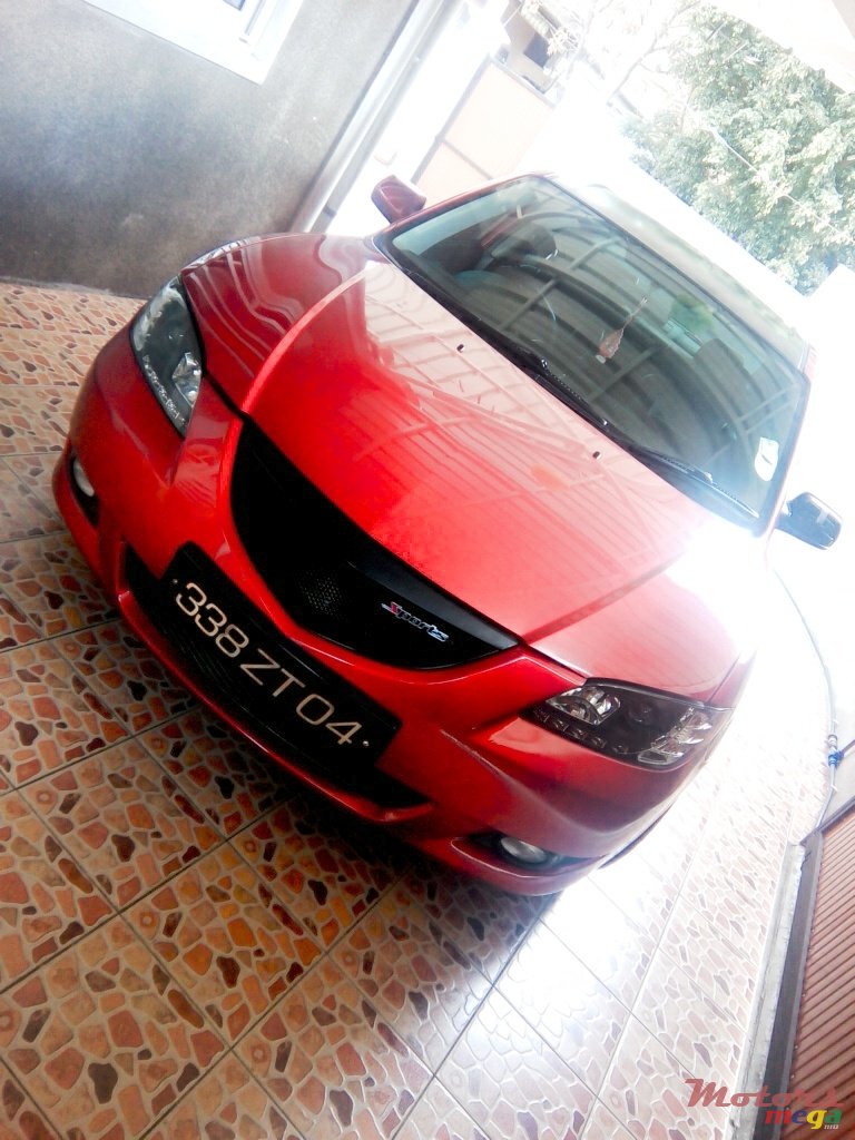 2004' Mazda 3 photo #1