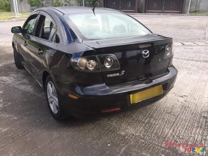 2004' Mazda 3 photo #2