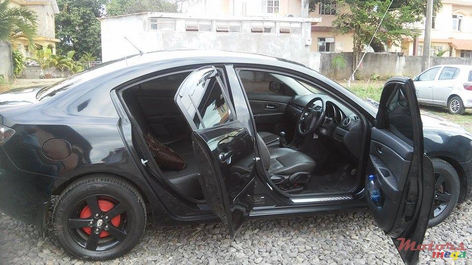 2006' Mazda 3 photo #1