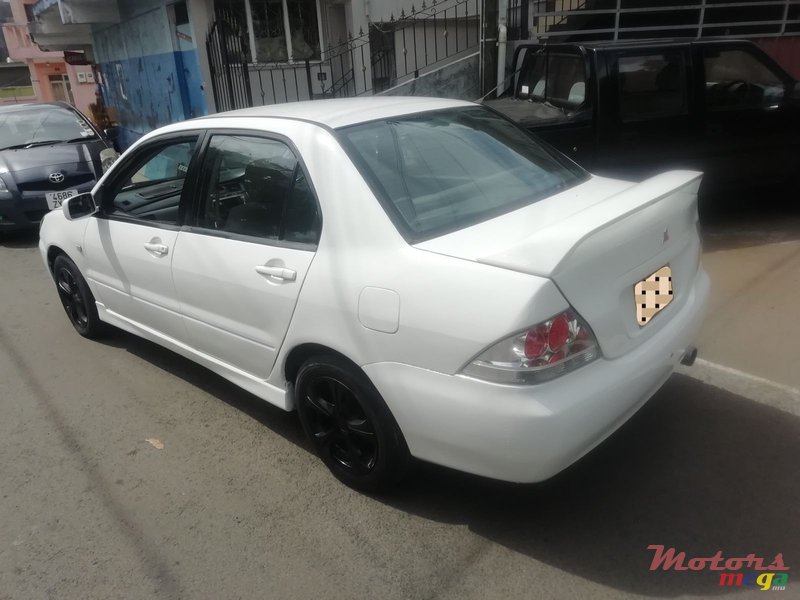 2004' Mitsubishi Lancer photo #4