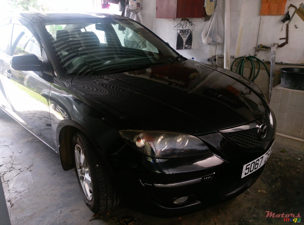 2004' Mazda 3 photo #1