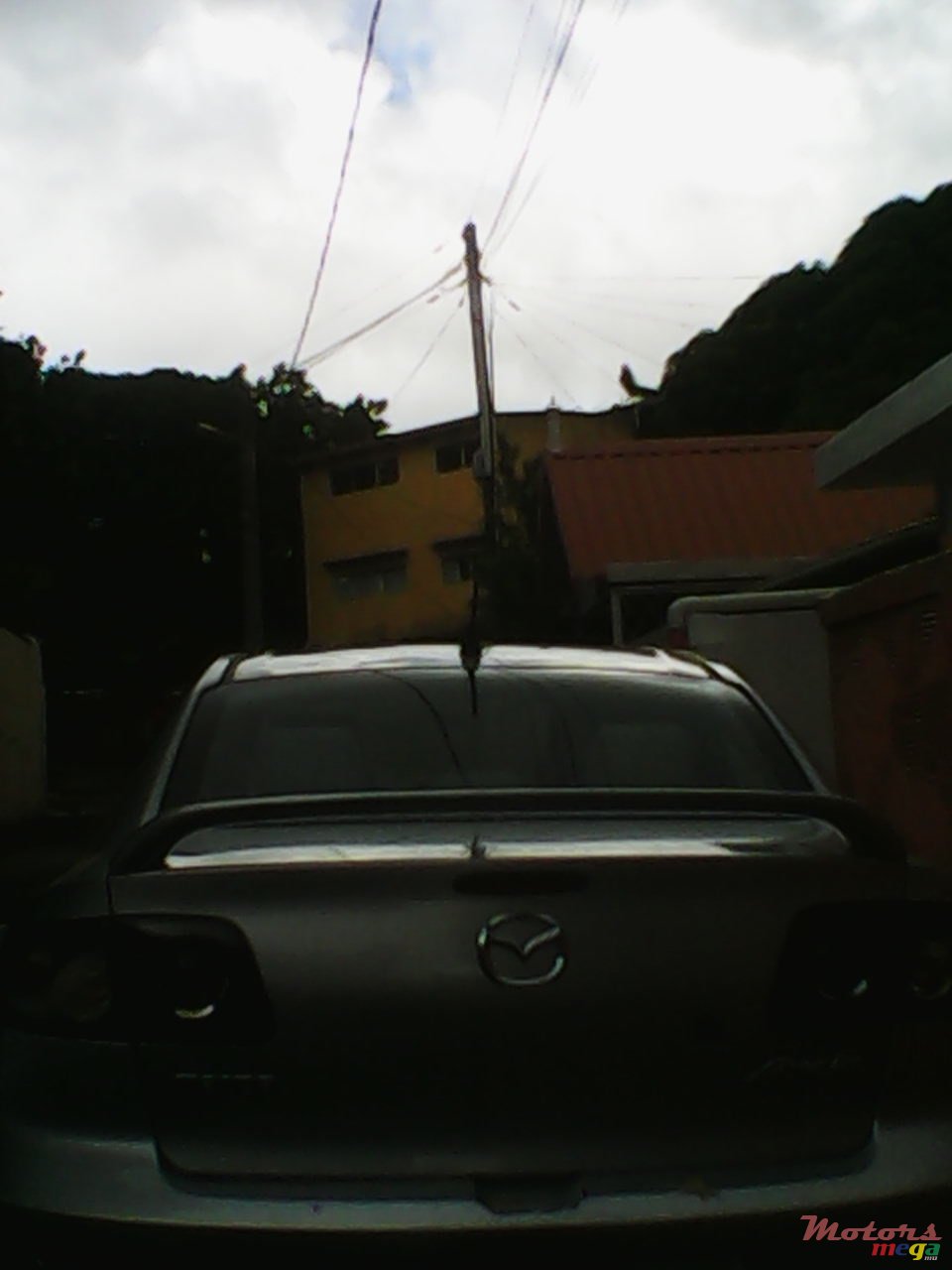 2006' Mazda 323 photo #1