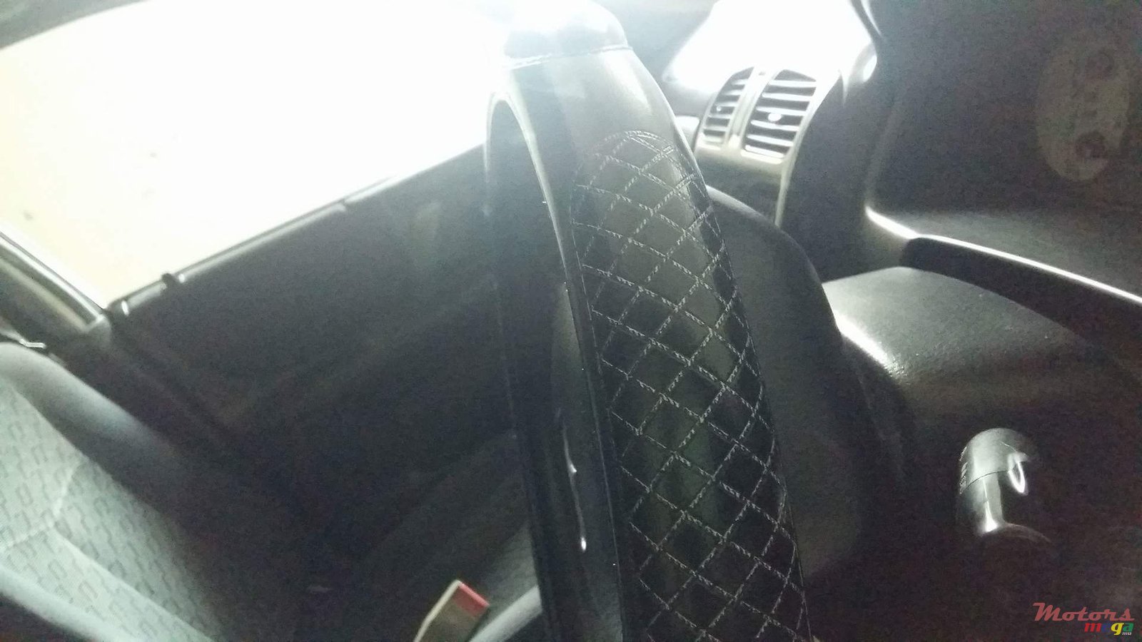 2001' Mazda 323 Hatch Back photo #4