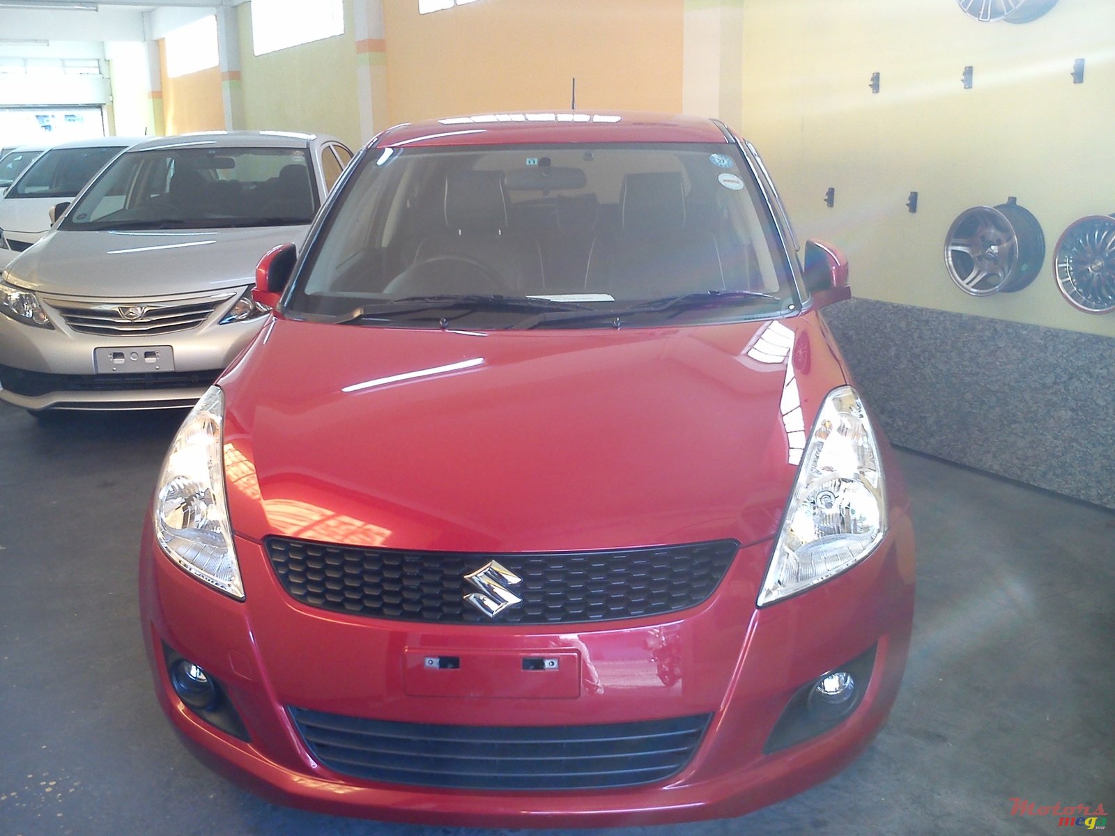 2012' Suzuki Swift photo #1
