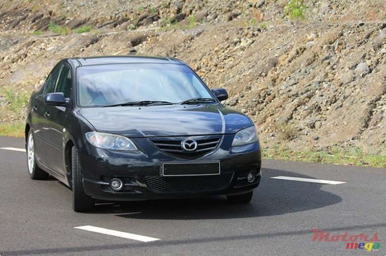 2009' Mazda 3 photo #1