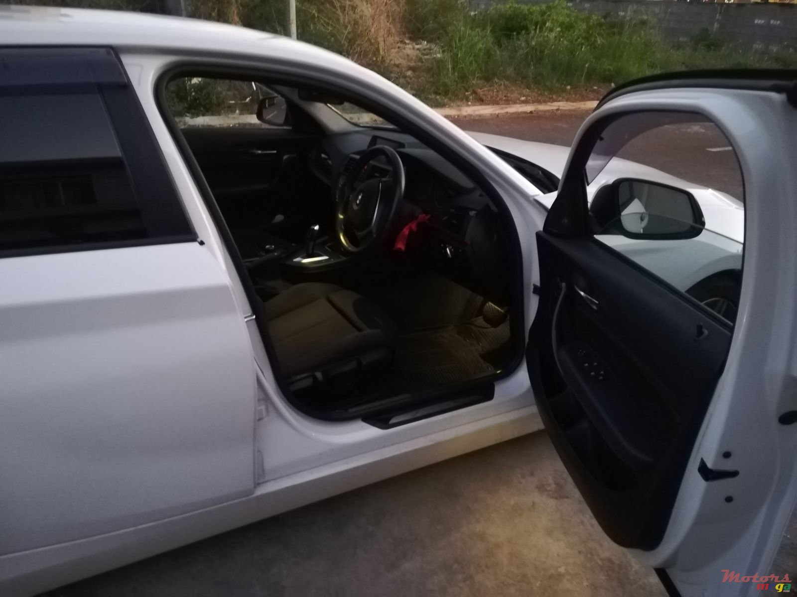 2012' BMW 116 photo #7