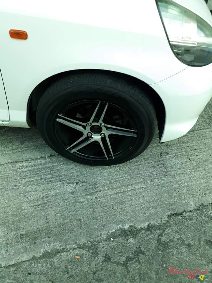 2004' Honda Fit Tinted windows, alloy tires photo #6