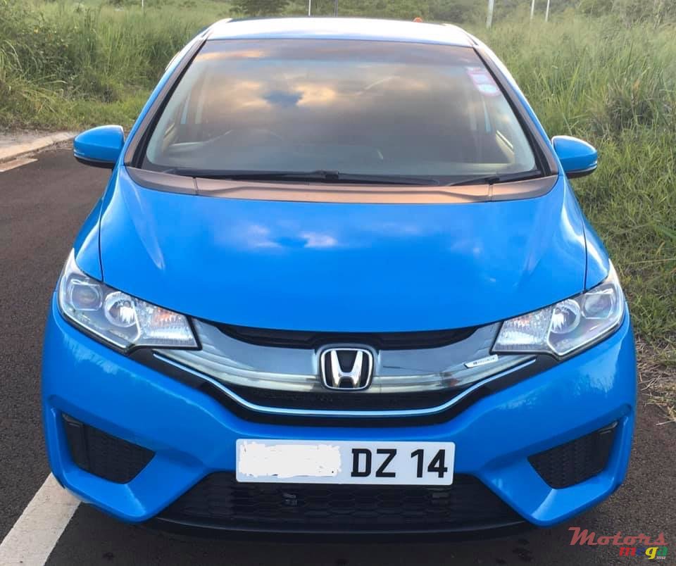 2014' Honda Fit Hybrid photo #1