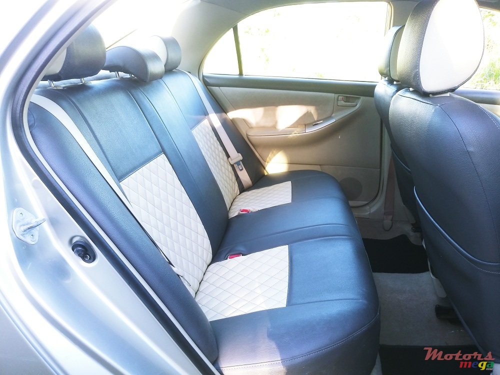 2004' Toyota Corolla Nze X photo #6