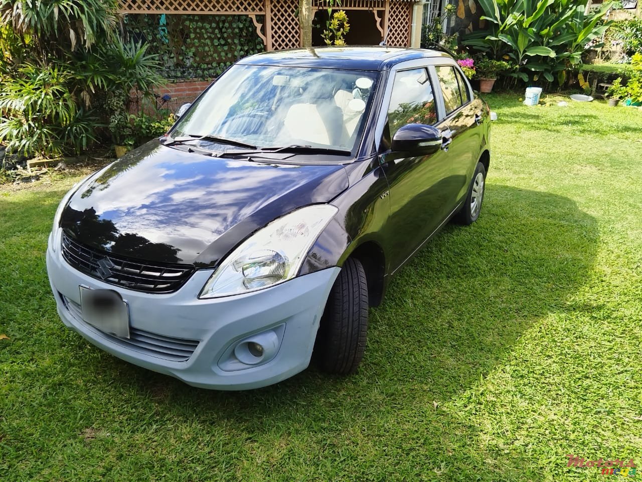 2013' Suzuki Swift DZIRE photo #1