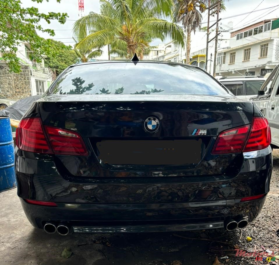 2012' BMW 523 photo #7