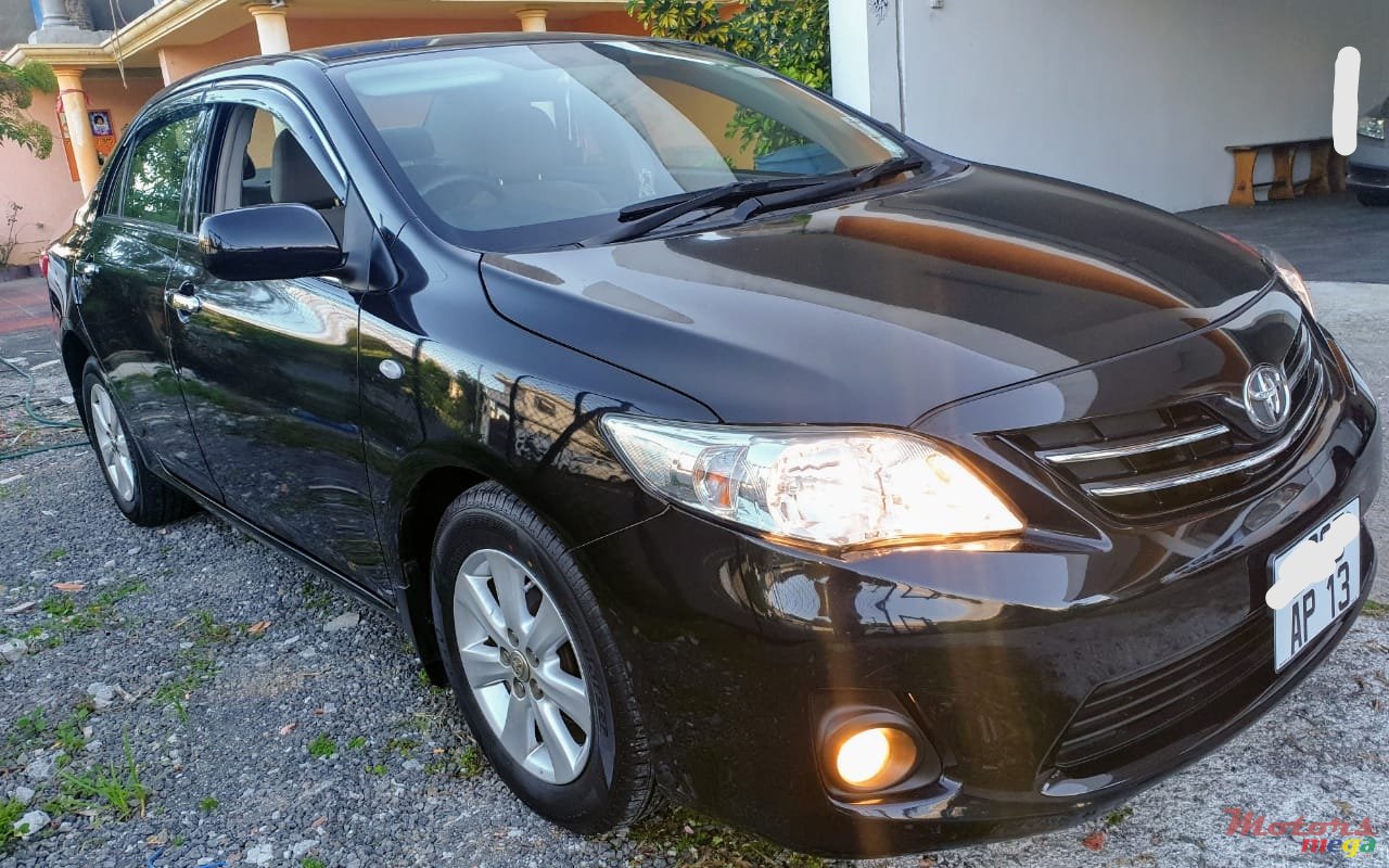 2013' Toyota Corolla photo #2