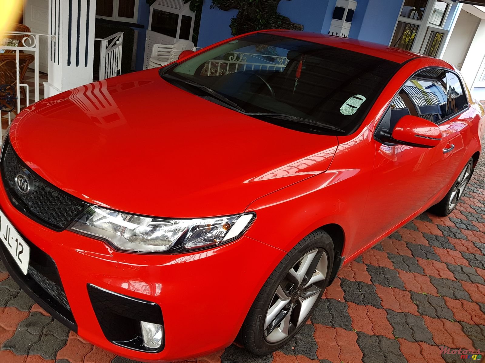 2012' Kia Cerato Coupé photo #1